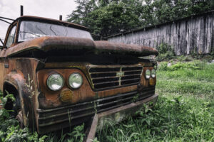 Old rusty junk car in Edmonton ready for cash removal and free pickup